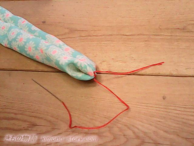 腰ひもの作り方・赤い糸はしっかり結ぶ